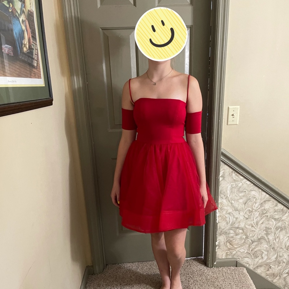 Super cute red cocktail with arm cuffs!
